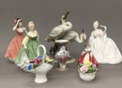 A quantity of ceramic figurines, including Royal Doulton,