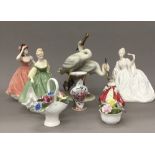 A quantity of ceramic figurines, including Royal Doulton,
