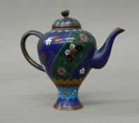 A small cloisonne teapot