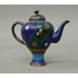 A small cloisonne teapot