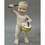 A porcelain figure of a drummer boy