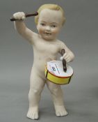 A porcelain figure of a drummer boy