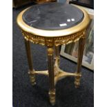 A marble topped gilt centre table