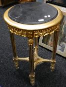 A marble topped gilt centre table
