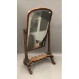 A Victorian mahogany cheval mirror