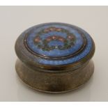 A small silver and enamel box. 4.5 cm wide, 2 cm high.