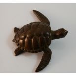 A bronze model of a turtle