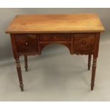 A 19th century mahogany lowboy