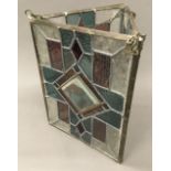 A Victorian leaded stained glass hanging lantern of triangular form