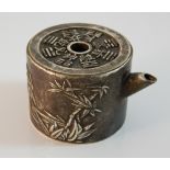 A Chinese miniature teapot. 4 cm high; 5 cm diameter.