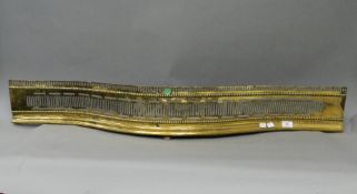 A 19th century brass fender. 17 cm high, 116 cm long, 19 cm deep.