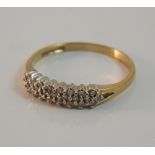 A 9 ct gold and diamond ring (1.