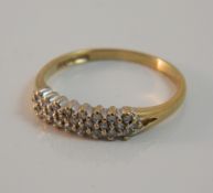 A 9 ct gold and diamond ring (1.