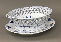 A Royal Copenhagen porcelain basket on stand