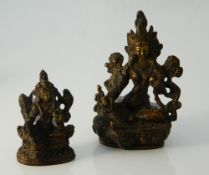 Two tiny bronze god figures