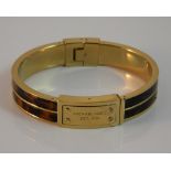 A Michael Kors bangle form bracelet