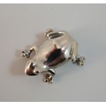A silver frog
