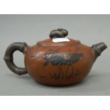 A Chinese Yixing teapot