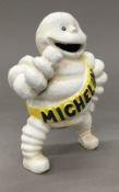 A cast iron model of a Michelin Man