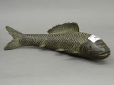 A bronze model of a fish