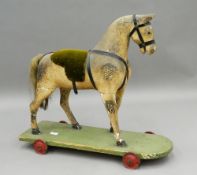 A Victorian child's horse on wheels