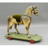 A Victorian child's horse on wheels