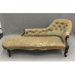 A Victorian rosewood framed chaise lounge