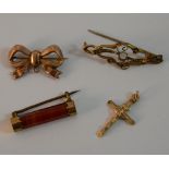 Two 9 ct gold brooches, a 9 ct gold crucifix (4.