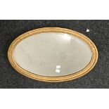 A small gilt framed mirror