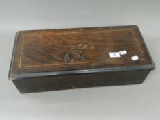A Victorian inlaid music box