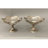 A pair of silver bon bon dishes (5.