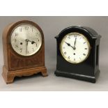 An ebonised mantle clock and an inlaid oak mantle clock