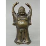 A bronze model of a Buddha