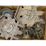 Two American wall clocks, various cuckoo clocks, etc.