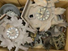 Two American wall clocks, various cuckoo clocks, etc.