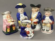 Five 19th century porcelain toby jugs