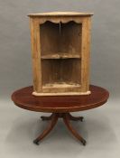 A pine hanging corner shelf and a reproduction coffee table