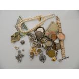 A quantity of coins, watches, pearls, etc.