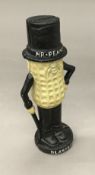 A cast iron Mr Peanut money box