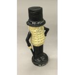 A cast iron Mr Peanut money box