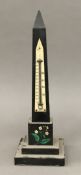 A 19th century specimen stone inset obelisk set with a thermometer