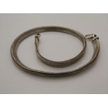 A silver necklace (74 grammes)