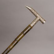 A 19th century Indian silver handled segmented horn walking stick With tapering shaft,