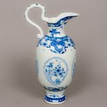 A Chinese blue and white porcelain ewer With loop handle,