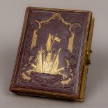 The British Army Album A Victorian gilt leather bound musical photograph album depicting various