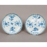 A pair of Chinese Kangxi blue and white porcelain dishes Each with a brown rim and decorated to the