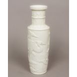 WANG BING RONG (1840-1900) Chinese A blanc de chine biscuit fired porcelain vase Of baluster form