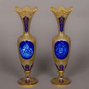 A pair of 19th century Bohemian glass vases Each of slender baluster form,