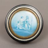 A 19th century ivory mounted horn snuff box Of circular form,