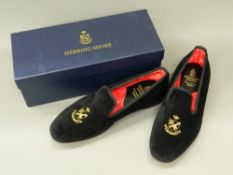 A boxed pair of velvet slippers With leather soles, a label to the interior Herring Shoes,